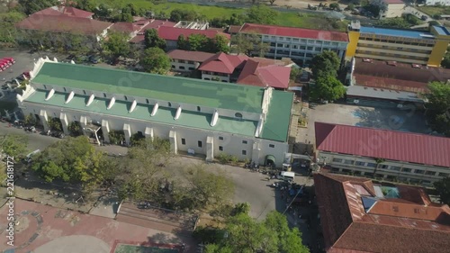 Cycling competitions March 3rd, 2018 hrough streets in the old city Vigan, Philippines. Aerial view of group of cyclist at professional race. Cyclist athletes riding a race at high speed. Bicycle race photo