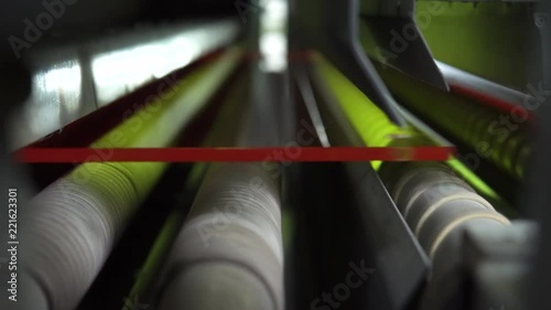Conveyor belt for production a window pane. Industrial equipment. Process of tempering glass. Machine for heating and cooling glass
