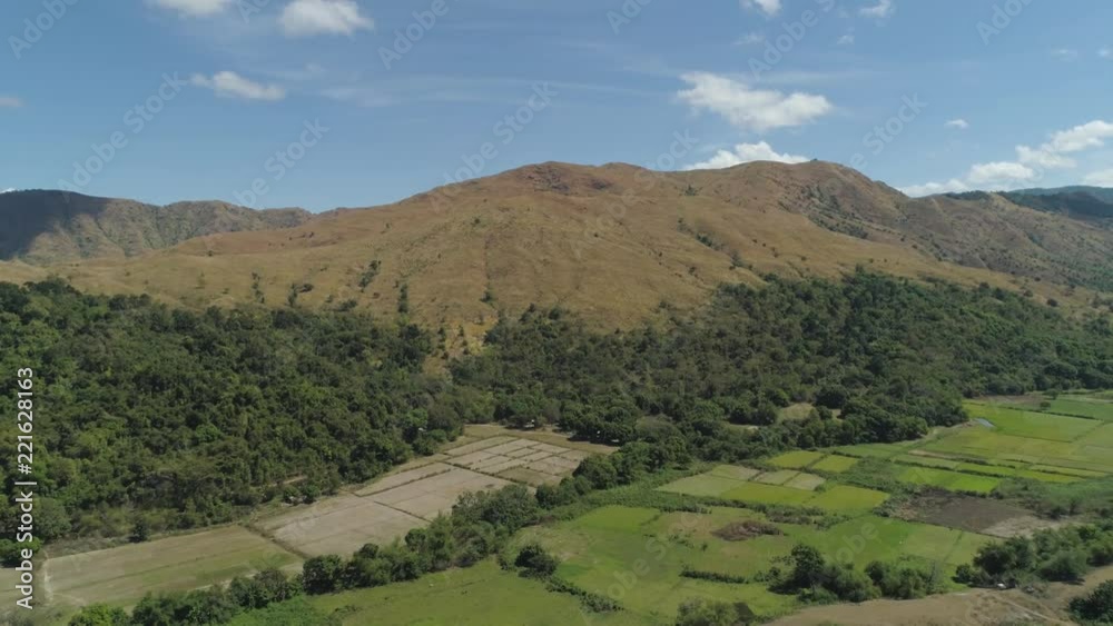 Mountain province with valley on the island of Luzon, Philippines. Aerial view of Mountains covered with forest. Mountain province with valley on the island of Luzon, Philippines. Aerial view of Mountains covered with forest.