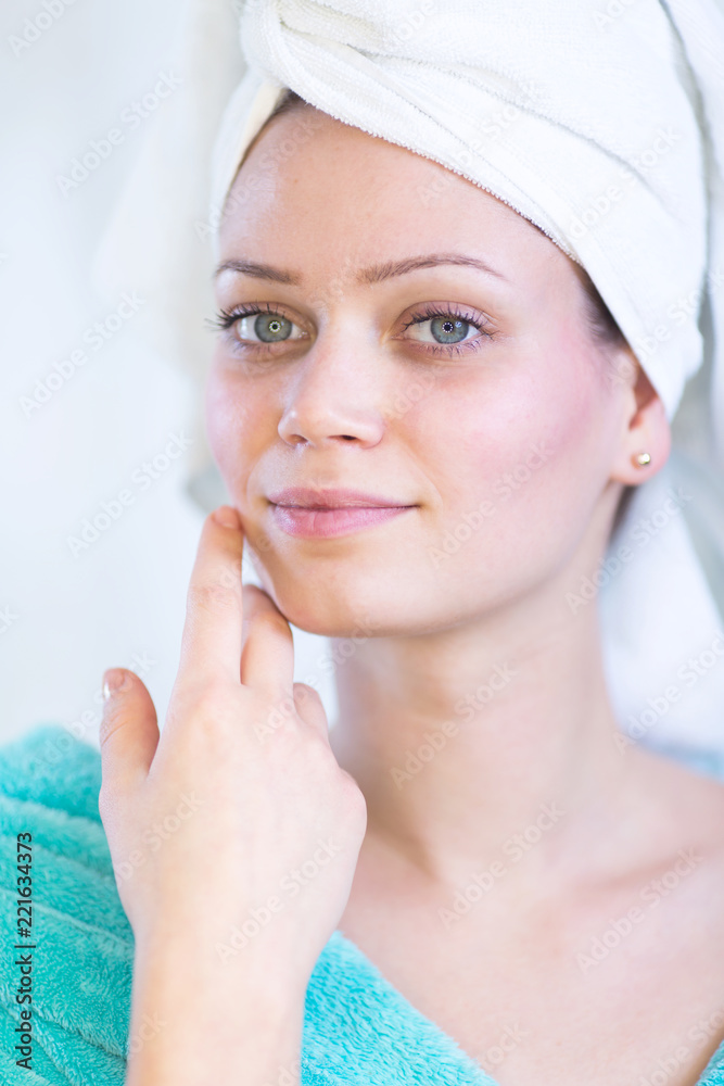 Beautiful young woman with hair in the towel Beautiful young woman with hair in the towel