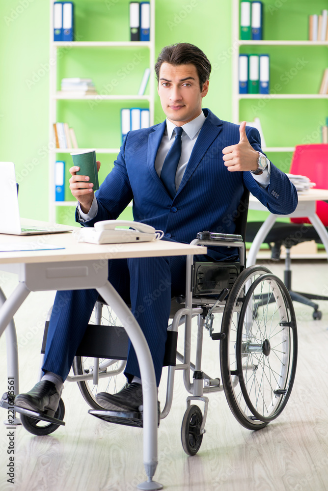 Disabled businessman working in the office Disabled businessman working in the office