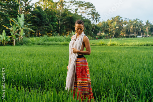 Obraz na plátně Woman in Ricefield