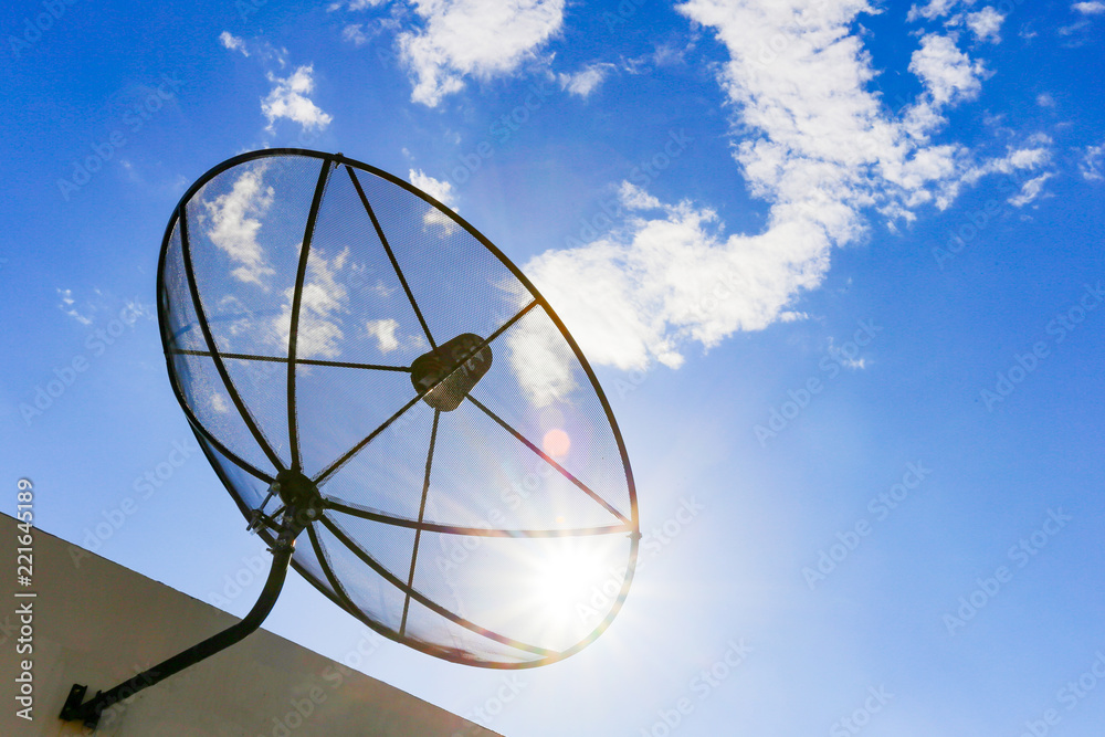 Satellite dish to the sky in blue sky background with tiny clouds