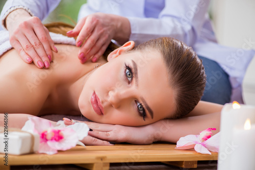 Young woman during spa procedure in salon