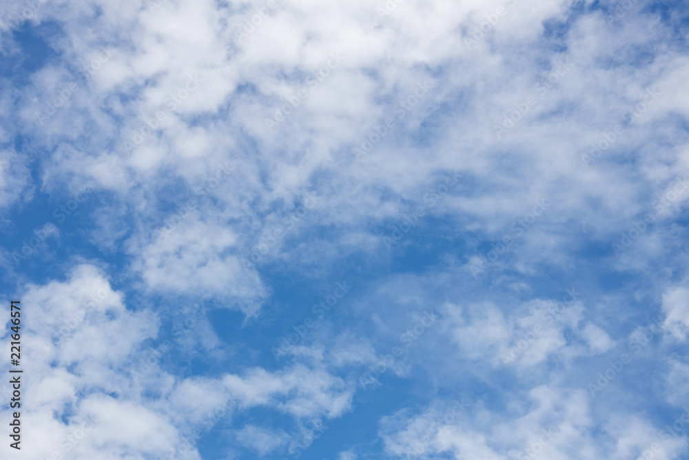 white fluffy clouds in the blue sky white fluffy clouds in the blue sky