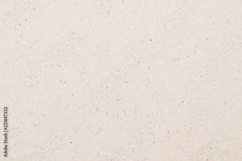 Particleboard, chipboard background with grainy texture of particle presses wooden panel or OSB Oriented strand board in light brown cream sepia color