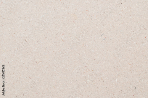 Particleboard, chipboard background with grainy texture of particle presses wooden panel or OSB Oriented strand board in light beige brown cream sepia color