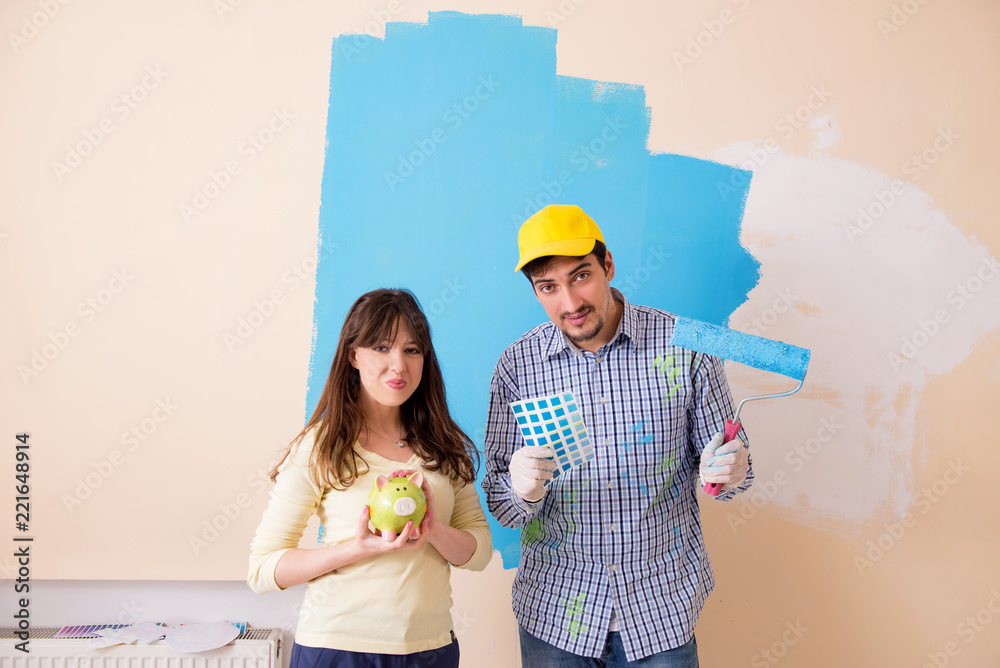 Husband and wife doing renovation at home