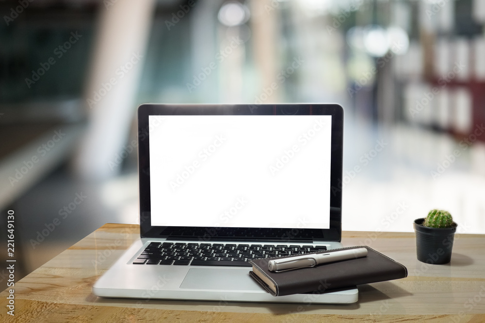 Laptop computer on workspace with mockup empty screen of laptop of present. Laptop computer on workspace with mockup empty screen of laptop of present.