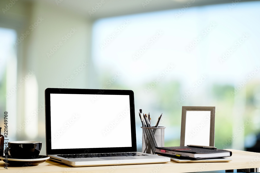 mockup office computer on desk with coffee cup ,notepad and photo frame, office workspace concept. mockup office computer on desk with coffee cup ,notepad and photo frame, office workspace concept.