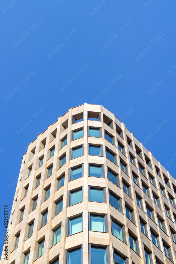 Skyscraper on blue sky background