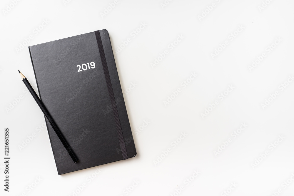 top view of black notebook with word 2019 top view of black notebook with word 2019