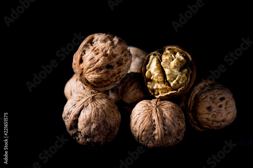 Walnuts on a black background