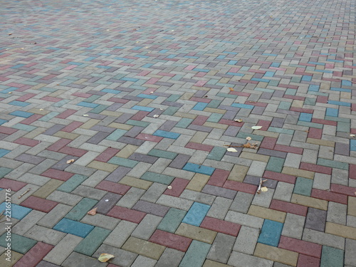 Surface of multi-colored paving slabs