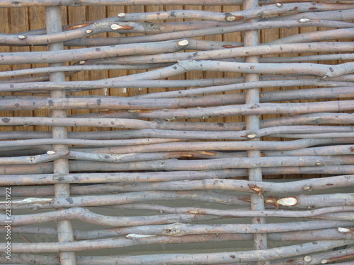 Wooden wattle fence of branchs