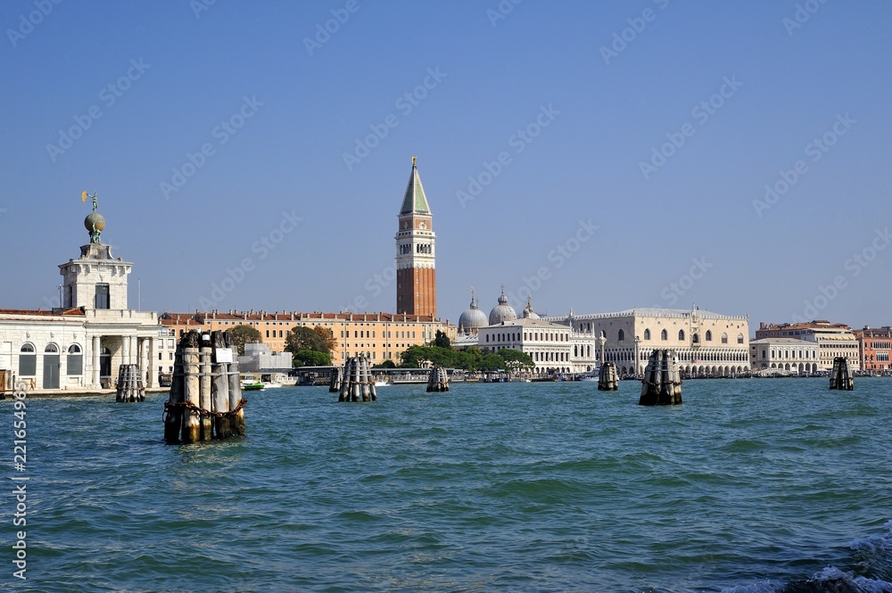 Venice tourist city seen from the sea with bell tower of piazza san marco