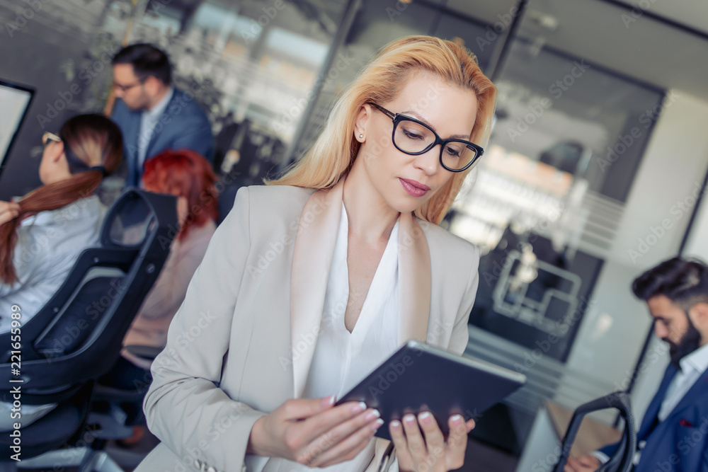 Businesswoman working with tablet