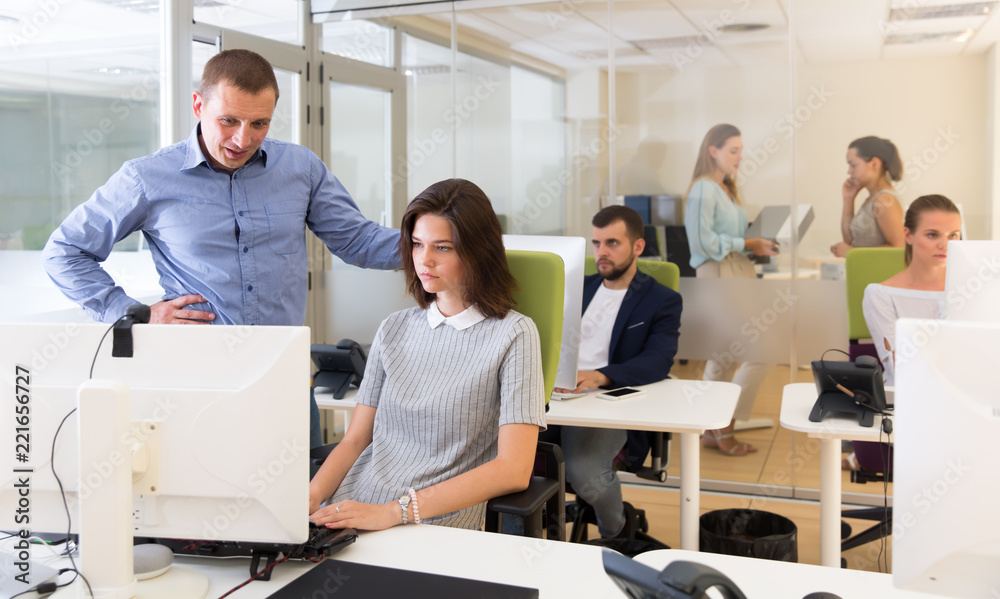 Fototapeta premium Chief executive explaining task to female