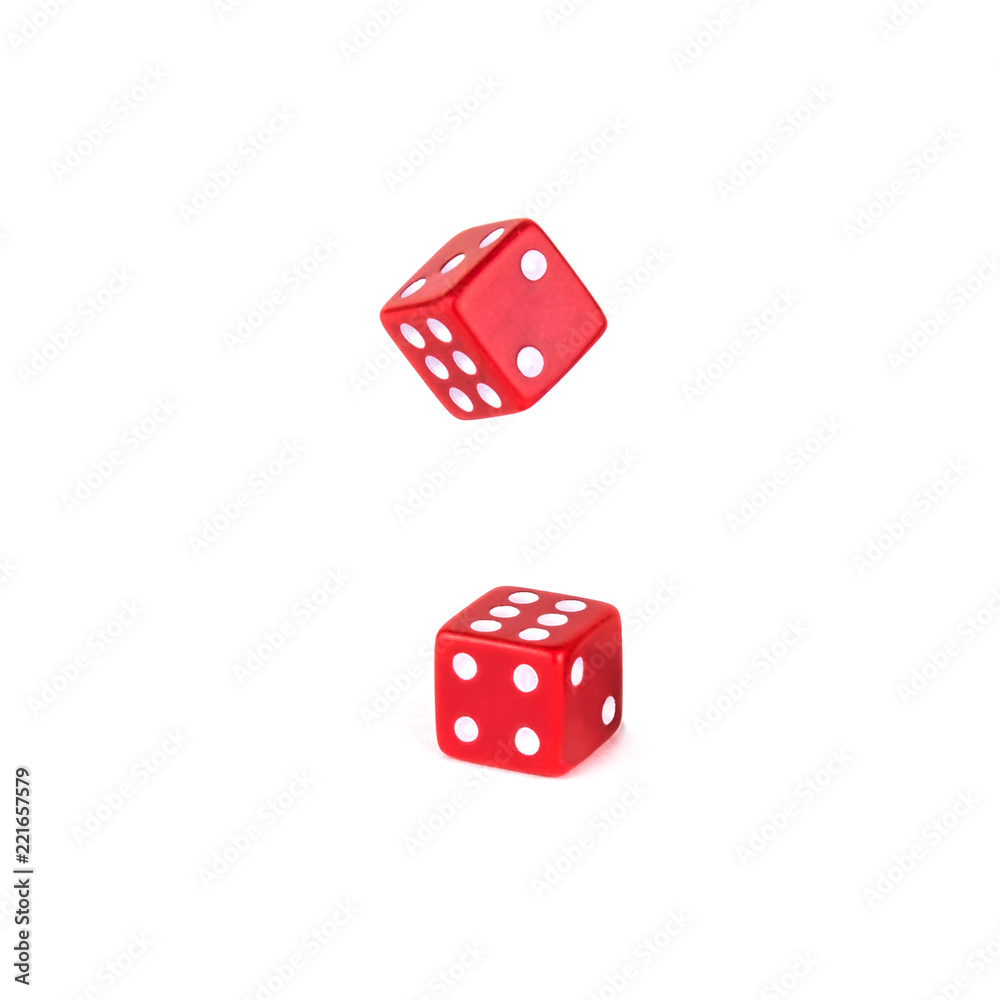 Two red dice isolated on white background. One dice still falls Two red dice isolated on white background. One dice still falls