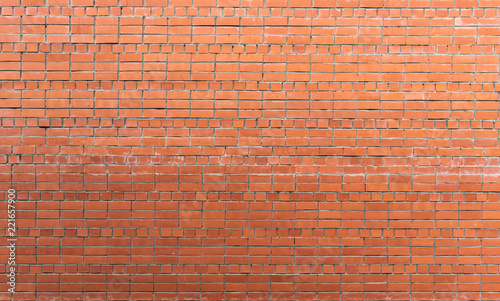 Red brick small wall texture, background