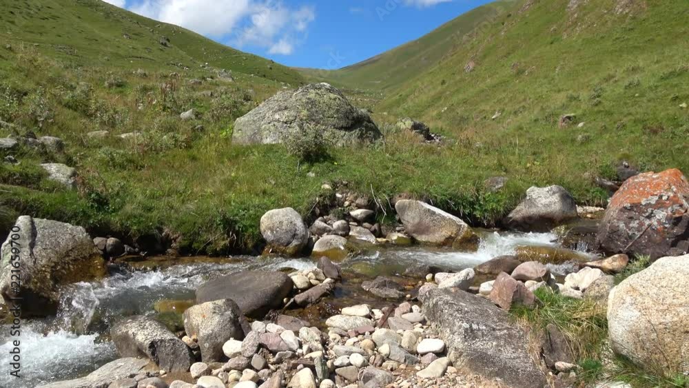 View mountains river scenes in national park Dombai, Caucasus, Russia, Europe. Summer landscape, sunshine weather, blue sky and sunny day View mountains river scenes in national park Dombai, Caucasus, Russia, Europe. Summer landscape, sunshine weather, blue sky and sunny day