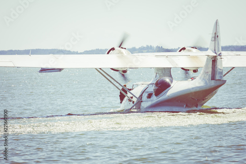 Flight Boat Consolidated PBY Catalina at Air Show Mazury 2018 event at the lake Niegocin in Gizycko. Poland. photo