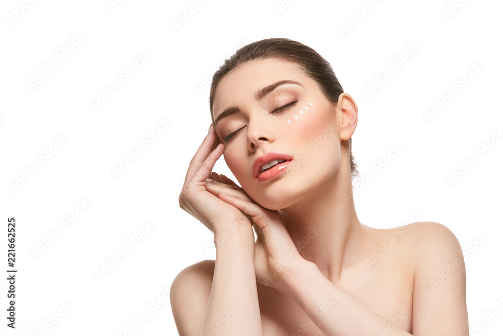 girl applying moisturizing cream isolated on white girl applying moisturizing cream isolated on white