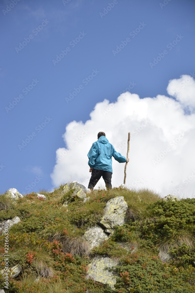 Young happy man on top of a mountain in Italy Young happy man on top of a mountain in Italy