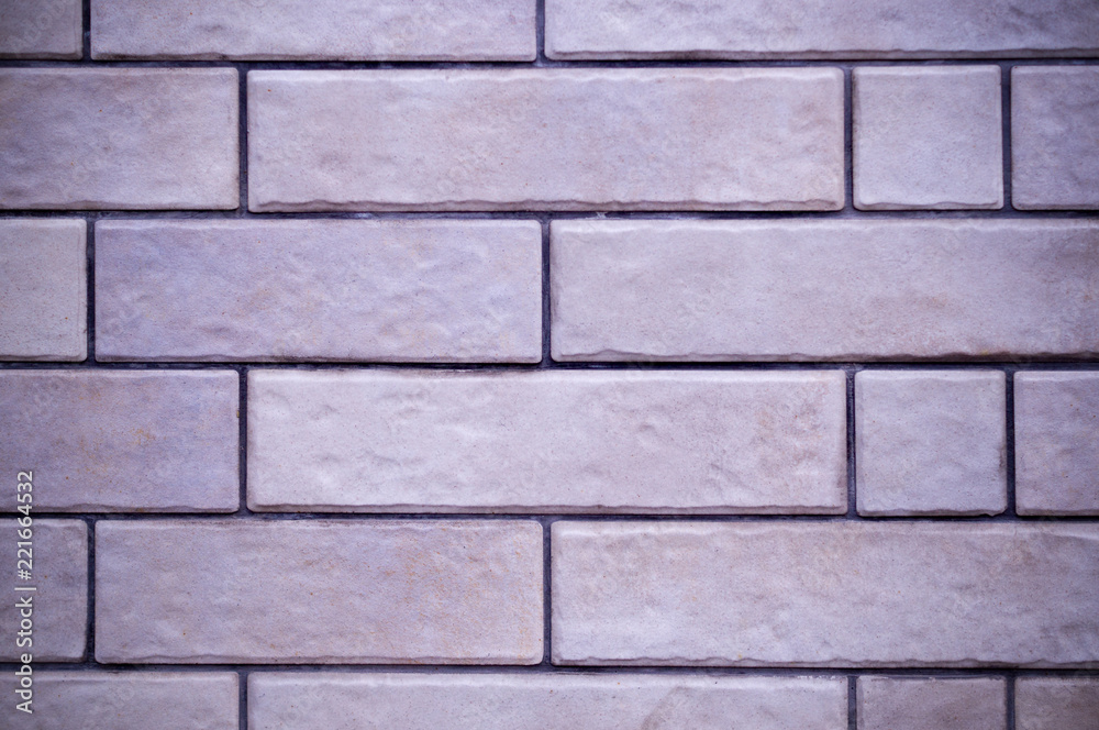 Obraz premium clean white brick wall background with vignette. texture, interiors, design.