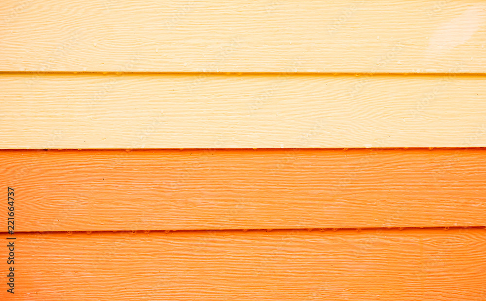 Wood orange background.orange Synthetic wood wall texture use for