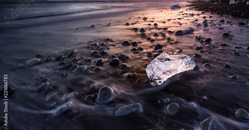 Icebergs in Jokulsarlon glacial lake during sunset, Iceland