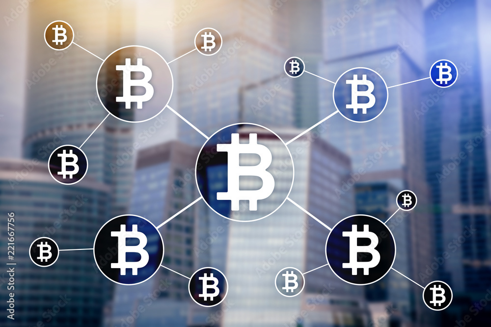 Bitcoin cryptocurrency and blockchain technology concept on blurred skyscrapers background. Bitcoin cryptocurrency and blockchain technology concept on blurred skyscrapers background.