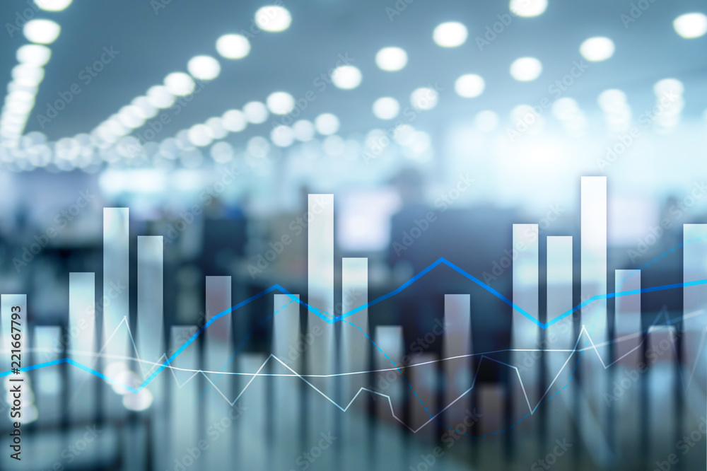 Financial graphs and charts on blurred business center background. Invesment and trading concept.