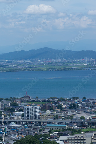 Fototapeta Naklejka Na Ścianę i Meble -  Aerial view of Lake Biwa and cityscape with summer color, Japan