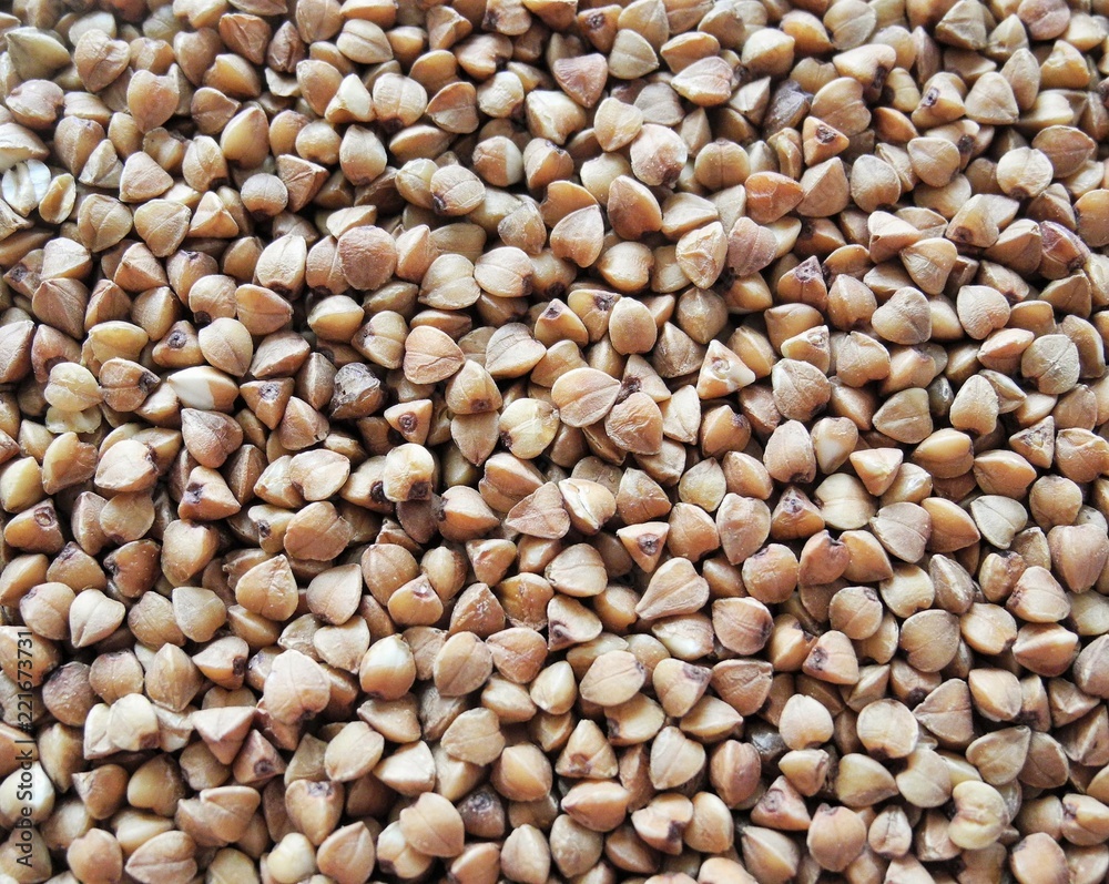 Roasted buckwheat macro top view background Roasted buckwheat macro top view background