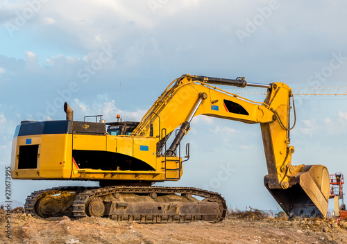 excavator blue sky heavy machine construction site