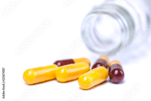 Medicine green and yellow pills or capsules
