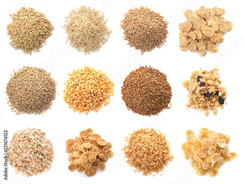 Valokuvatapetti Set with different cereal grains on white background, top view