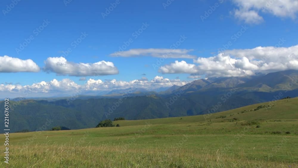 View mountains scenes in national park Dombai, Caucasus, Russia, Europe. Summer landscape, sunshine weather, blue sky and sunny day View mountains scenes in national park Dombai, Caucasus, Russia, Europe. Summer landscape, sunshine weather, blue sky and sunny day