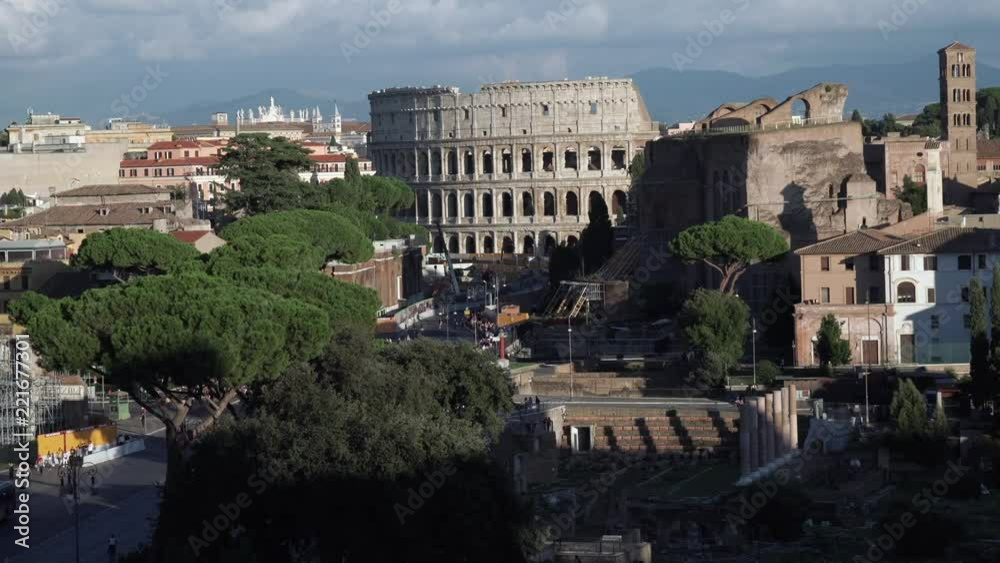 Panoramic view over Ancient Rome with the Roman wonder Coliseum, Colosseum or Colosseo Panoramic view over Ancient Rome with the Roman wonder Coliseum, Colosseum or Colosseo
