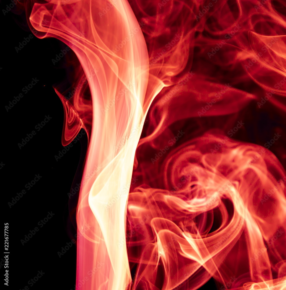 Naklejka premium Red smoke on black background