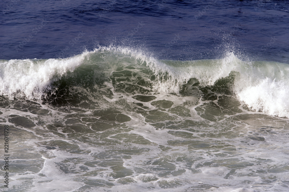 A view of strong waves in Pacific ocean in sunset beach, California in summer time