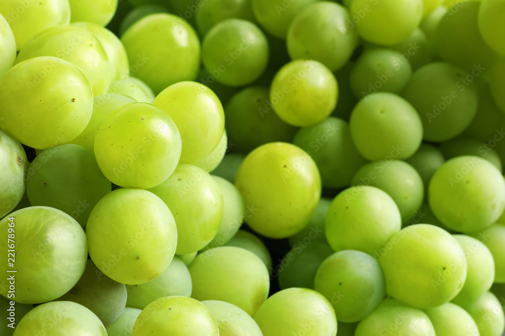 Bunch of green fresh ripe juicy grapes as background, closeup Bunch of green fresh ripe juicy grapes as background, closeup