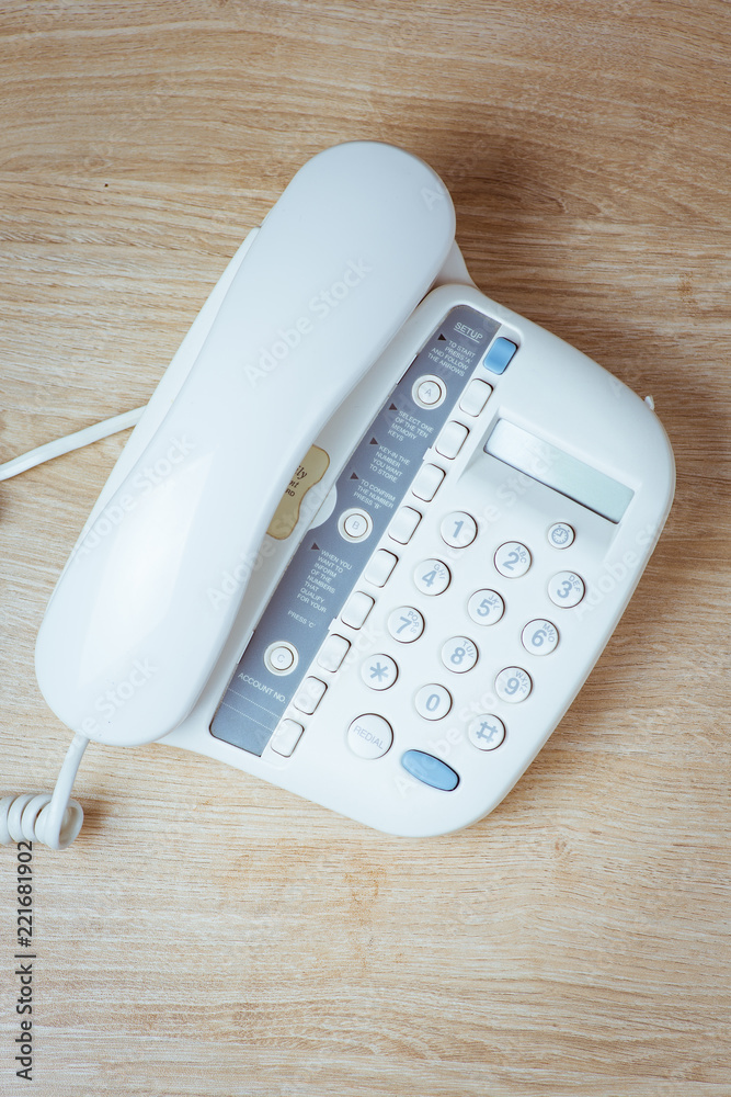 Telephone on wooden background Telephone on wooden background