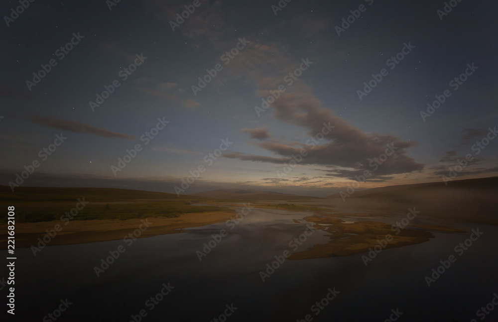 Night landscape with a river and clouds, Yamal, Polar Urals, Russia