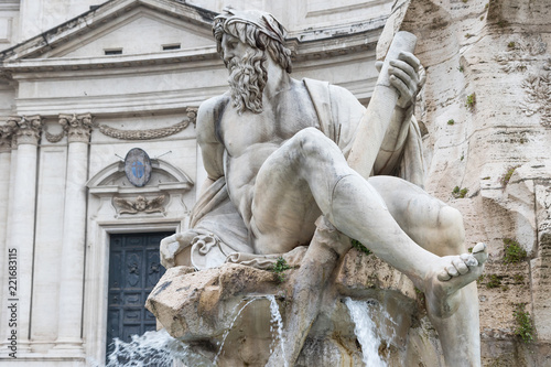 Zeus Statue in Fountain of the Four Rivers in the Piazza Navona (Navona Square) in Rome was designed in 1651 by Gian Lorenzo Bernini. Italy.