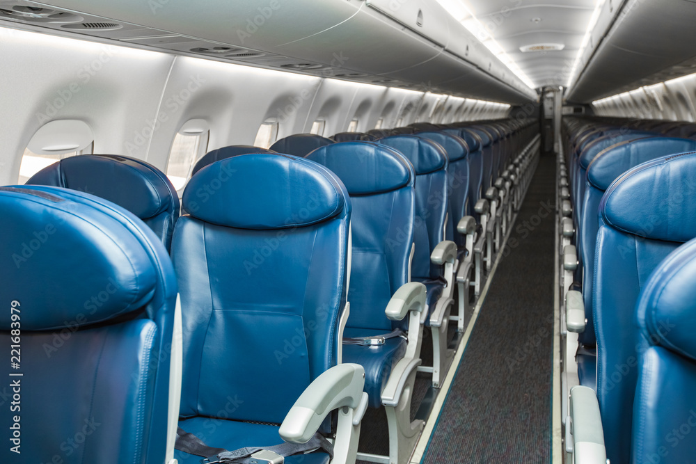 Fototapeta premium Empty seats in economy class airplane