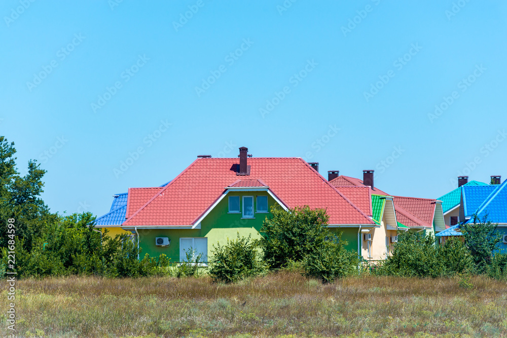 A section of colorful terraced housing in a west country seaside town A section of colorful terraced housing in a west country seaside town