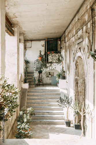 Fototapeta Naklejka Na Ścianę i Meble -  Beautiful streets and courtyards of Naples, historical sites and sculptures of the city. The monuments and architecture of ancient Italy. panorama of the city, species and tourist places. 