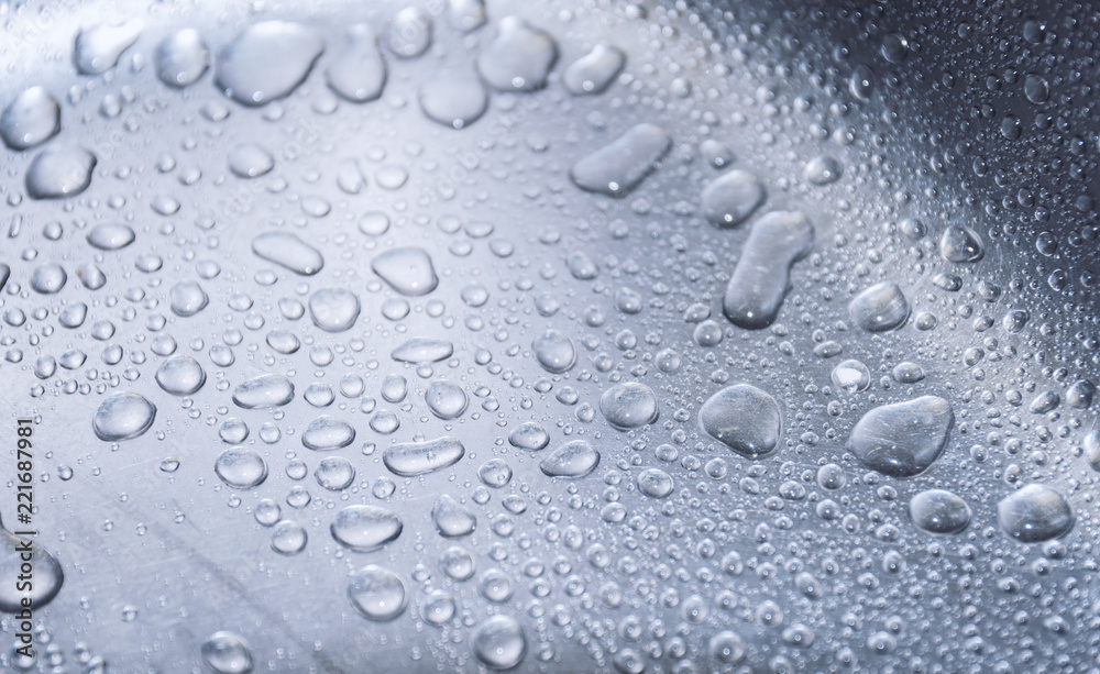 Water drops on metal surface. Macro with shallow depth of field. Water drops on metal surface. Macro with shallow depth of field.